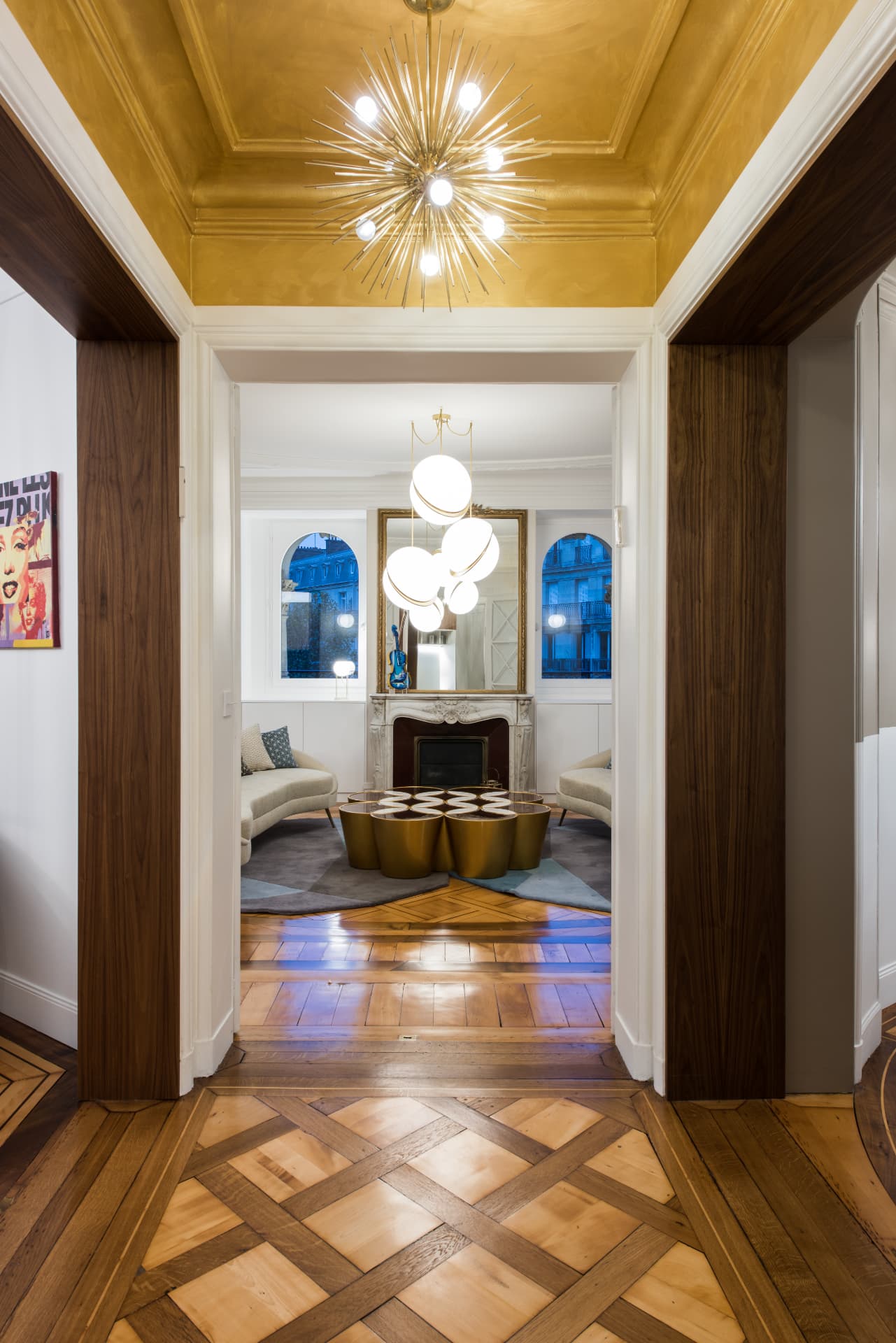Salon d'apparat haussmannien au plafond doré rénové par Groupe RSM
